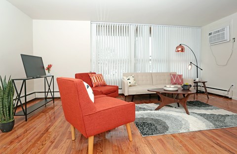 a living room with a couch and a chair